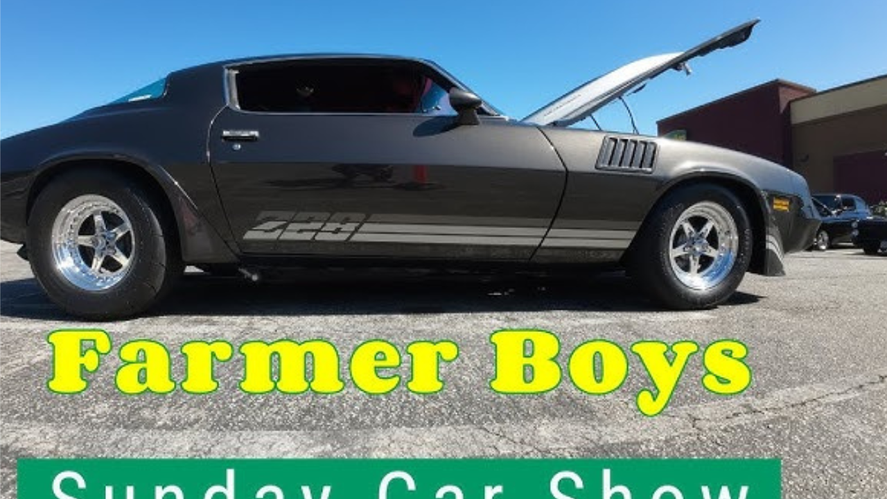 A vibrant crowd enjoying the Farmer Boys Gardena Car Show with families, car enthusiasts, and classic cars displayed under sunny skies.